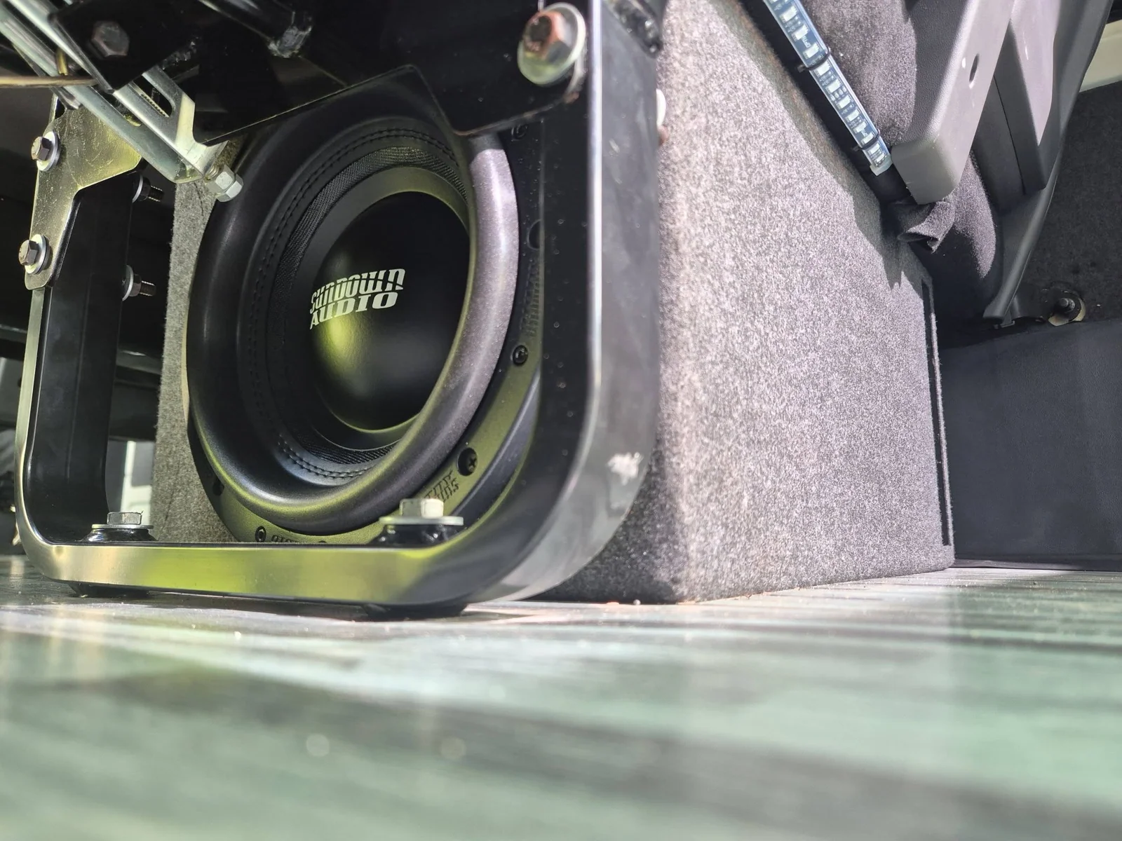 Installed car subwoofer and enclosure